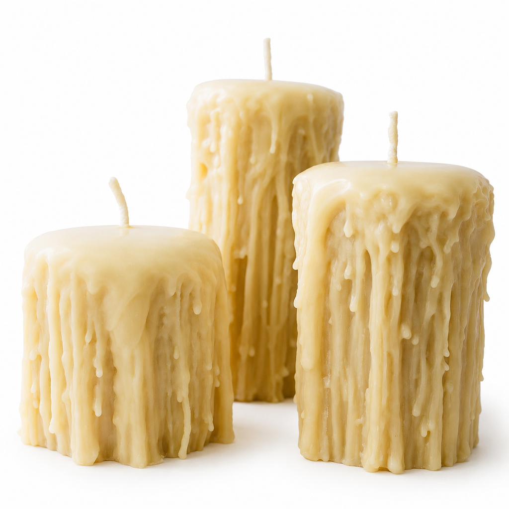 Set of three Gothic-style pure beeswax candles by Serenes Beeswaxory, featuring tall, ornate pillar candle design.