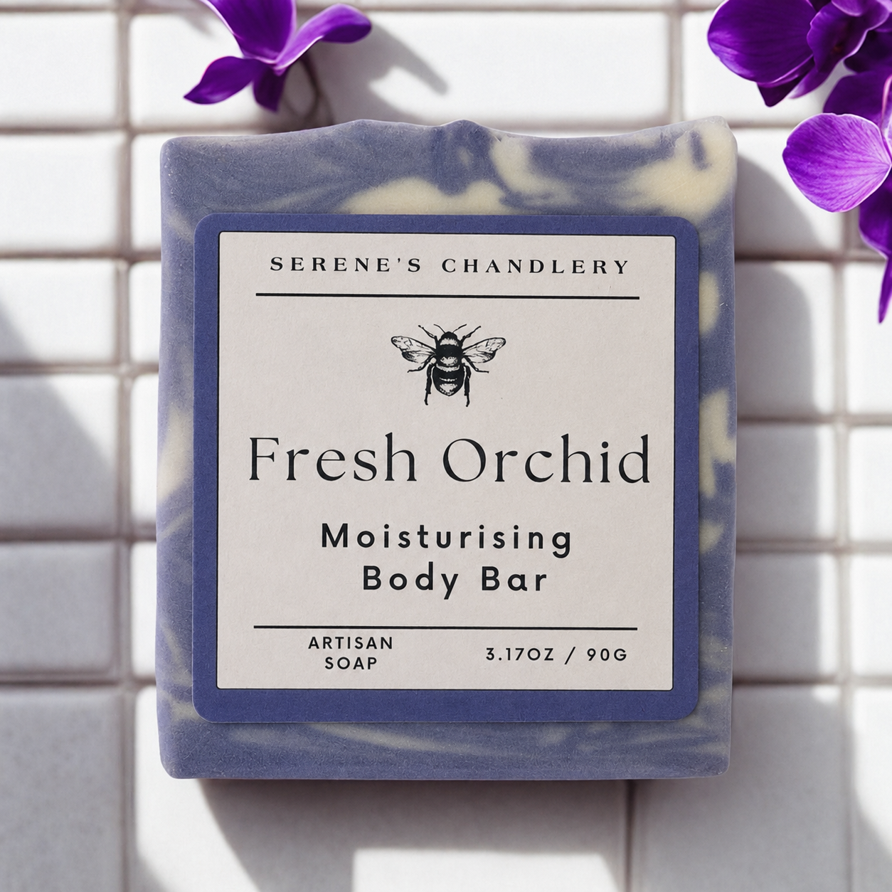 Handmade pure soap with fresh orchid and castor oil, skincare essential by Serenes Beeswaxory, showing the soap bar with floral accents.