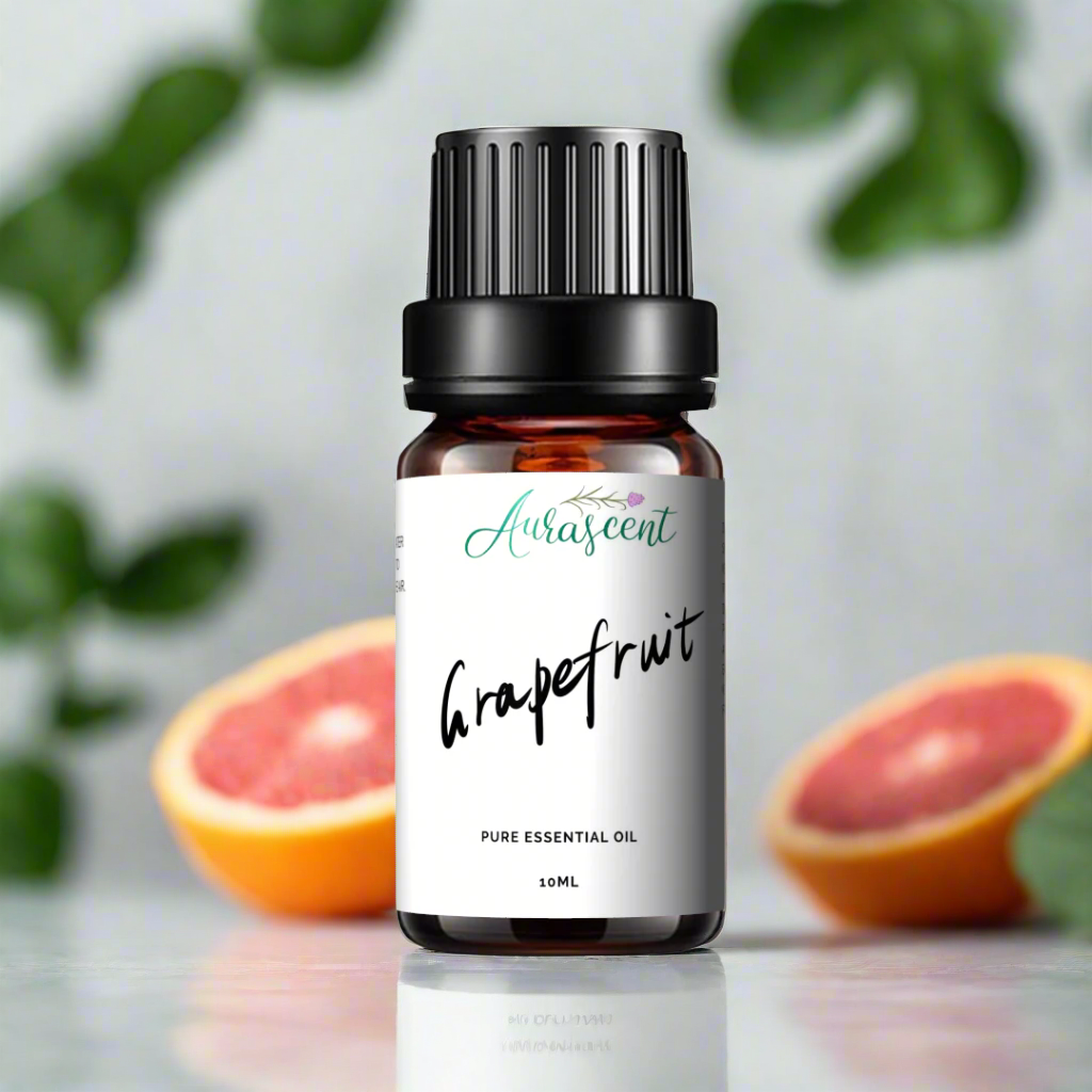 Aurascent Grapefruit Essential Oil 10ml bottle with fresh grapefruit slices and botanical elements on a white background.
