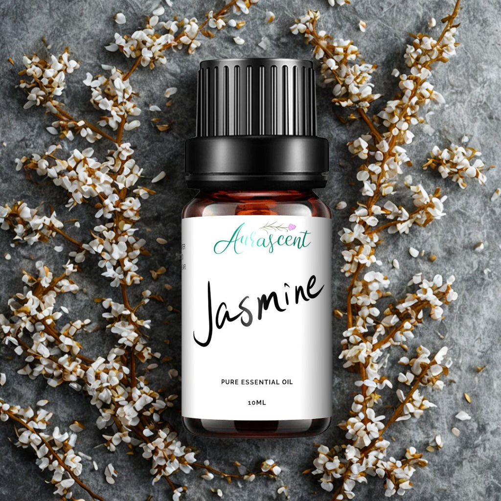 A 10ml bottle of Aurascent Jasmine Essential Oil, with clear glass bottle and label, on a neutral background.