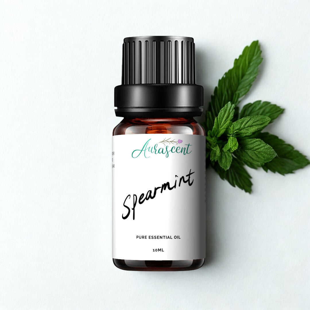 A 10ml bottle of Aurascent Spearmint Essential Oil with a clear label, placed on a white background.