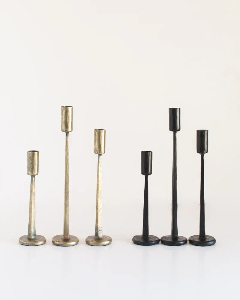 Dante hand-forged iron candlestick with brass finish from Creative Women Australia, designed as a decorative candle stand.