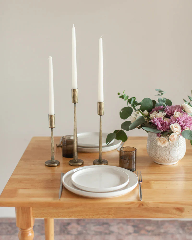 Creative Women Australia Dante hand-forged iron candlestick stand with a brass finish, designed for holding candles securely.