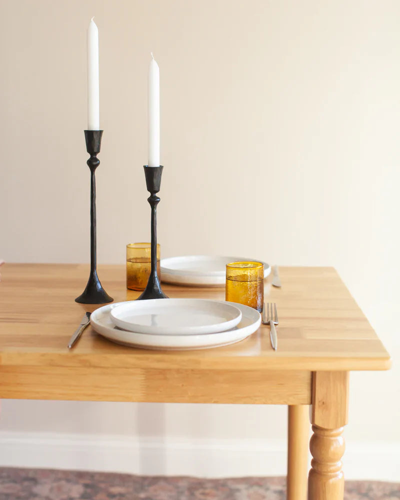 Set of two Gemini hand-forged iron candlestands with brass finish, decorative candle holders from Creative Women Australia.