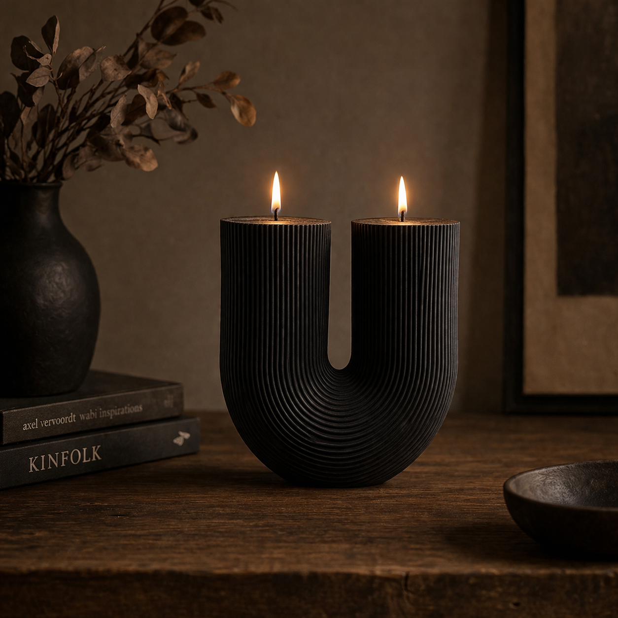 Black Cranberry Arch Candle by Escape to Paradise, with a sleek black design and decorative arch shape, perfect for cozy ambiance.