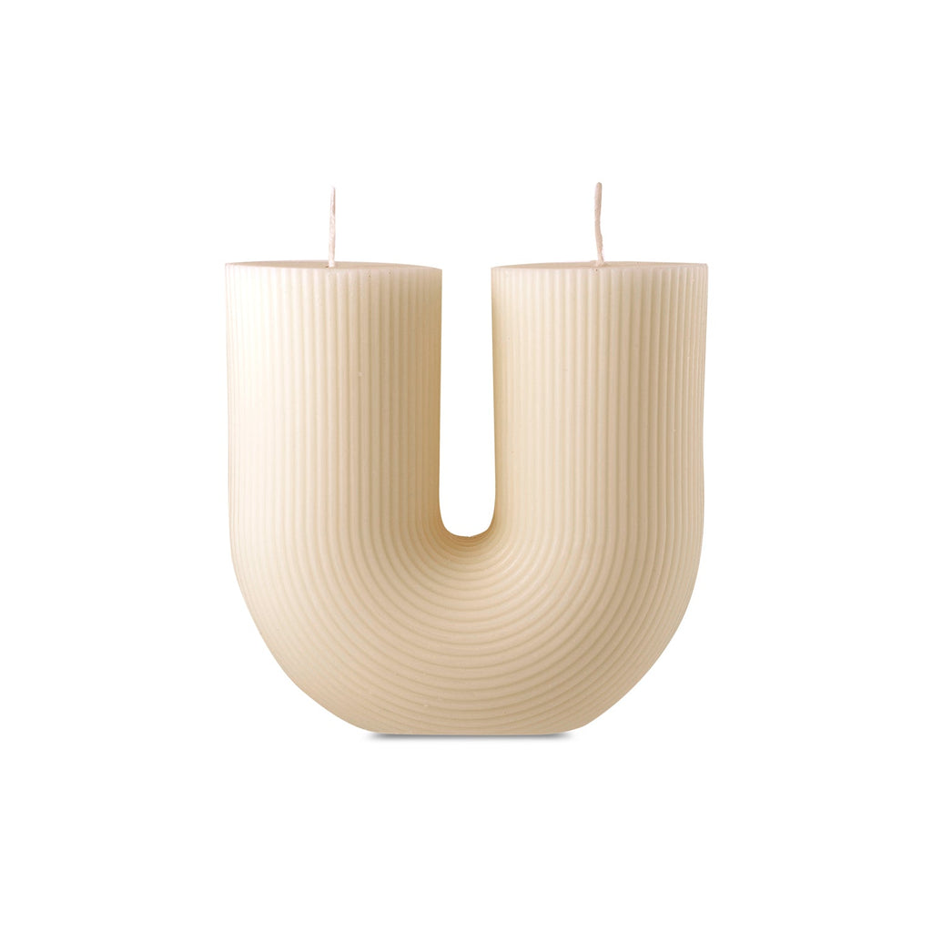 Natural Arch Candle by Escape to Paradise, showcasing a sleek, minimalist candle with a smooth finish in a natural color.
