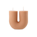 Orange blossom scented Arch Candle by Escape to Paradise, showcasing a decorative candle with a warm, inviting glow.