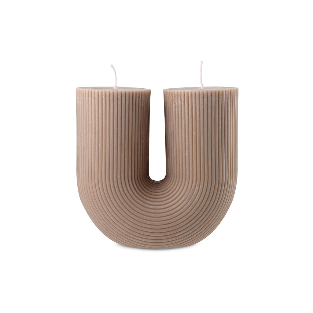 Escape to Paradise Arch Candle in Sea Salt & Caramel scent, showcasing the elegant design and warm glowing ambiance.