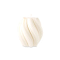 Swirl candle by Escape to Paradise in Lime Basil & Citrus scent, featuring a decorative design and warm glow.