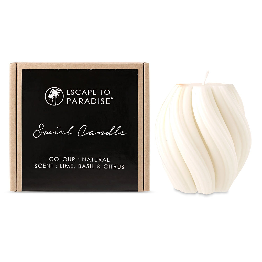 Swirl candle by Escape to Paradise in Lime Basil & Citrus scent, with a decorative swirling design and soft glow.