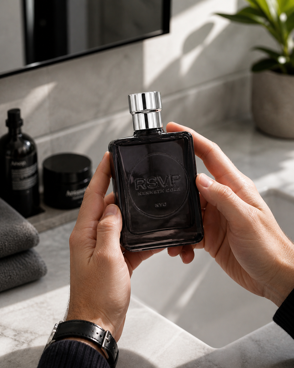 Kenneth Cole RSVP 100ml men's Eau de Toilette bottle, sleek design, with the Kenneth Cole branding visible.