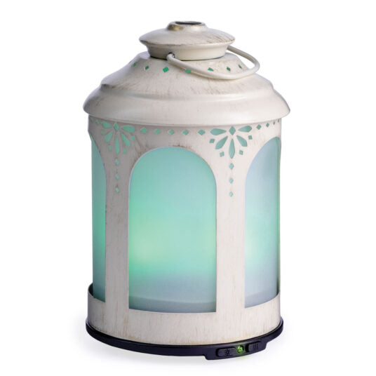 NNE Living Chelsea Lantern Ultrasonic Aroma Diffuser emitting a gentle mist, designed for home fragrance and humidification.