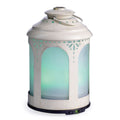 NNE Living Chelsea Lantern Ultrasonic Aroma Diffuser emitting a gentle mist, designed for home fragrance and humidification.