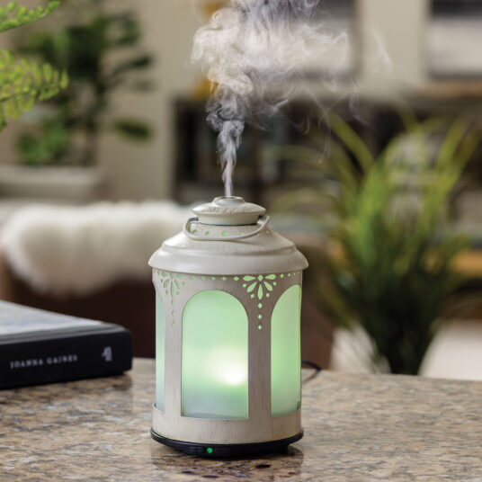 NNE Living Chelsea Lantern Ultrasonic Aroma Diffuser emitting mist, decorative appliance for essential oils and humidification.