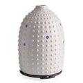 NNE Living Hobnail Ultrasonic Aroma Diffuser showing a sleek ceramic design with mist and LED light features.