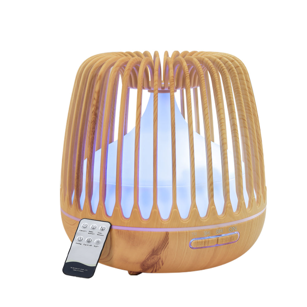 NNEDSZ 4-in-1 aromatherapy humidifier and diffuser showing a sleek white design with mist and essential oil chamber.