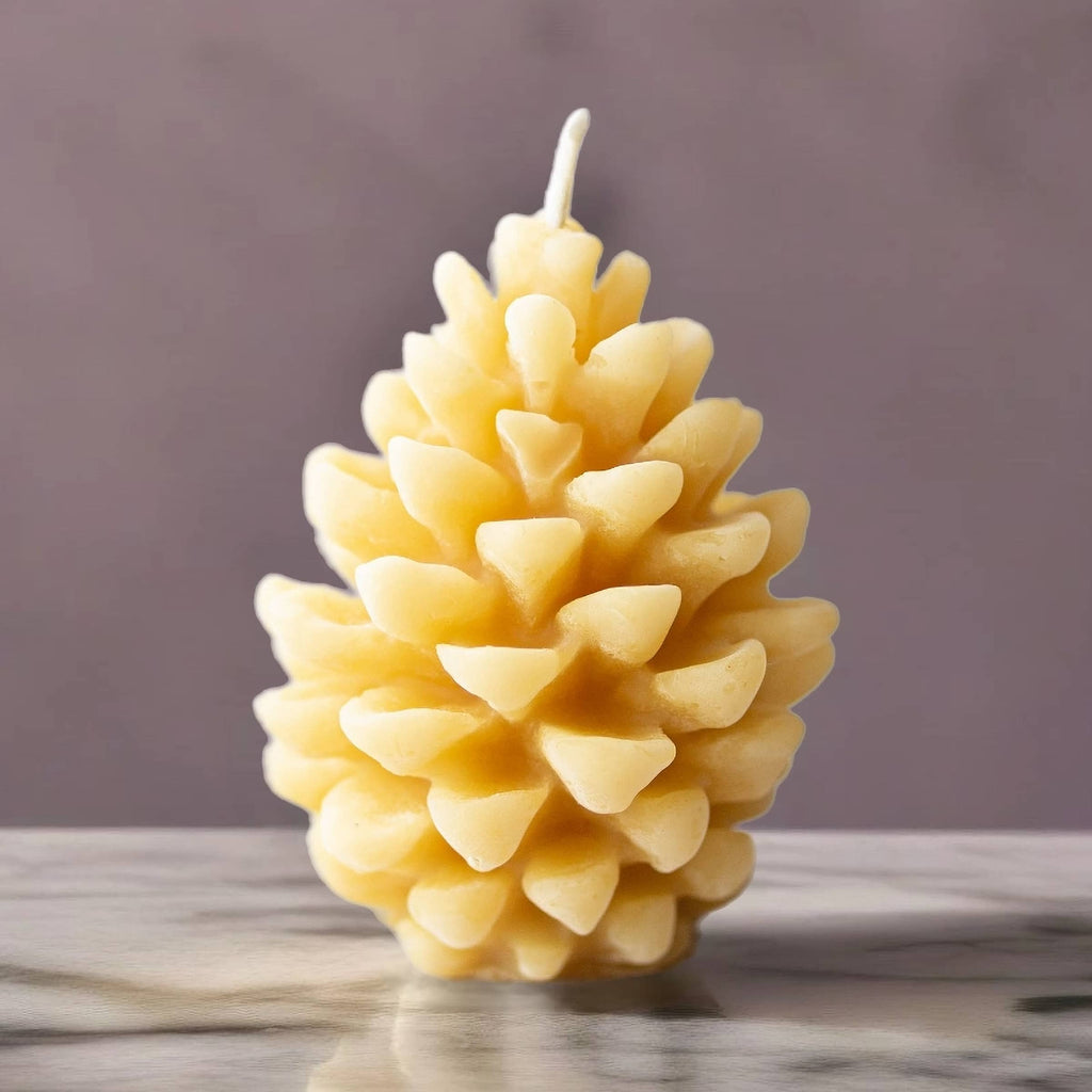 Serenes Beeswaxory pinecone design pure beeswax candles with natural pinecone shapes, showcasing warm, handcrafted beeswax candle artistry.