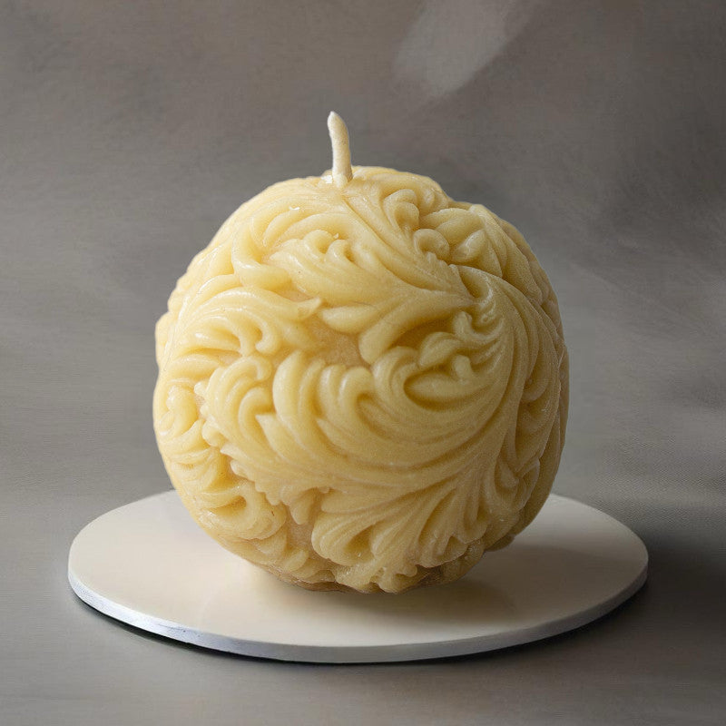 Serenes Beeswaxory sphere filigree candles made of pure beeswax with intricate filigree design, perfect for ambient lighting.