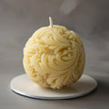 Serenes Beeswaxory sphere filigree candles made of pure beeswax with intricate filigree design, perfect for ambient lighting.