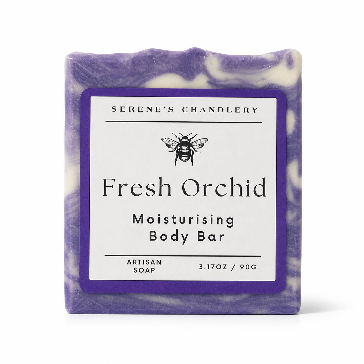 Handmade pure soap with fresh orchid and castor oil, Serenes Beeswaxory skincare essentials, showing the soap bar with floral details.
