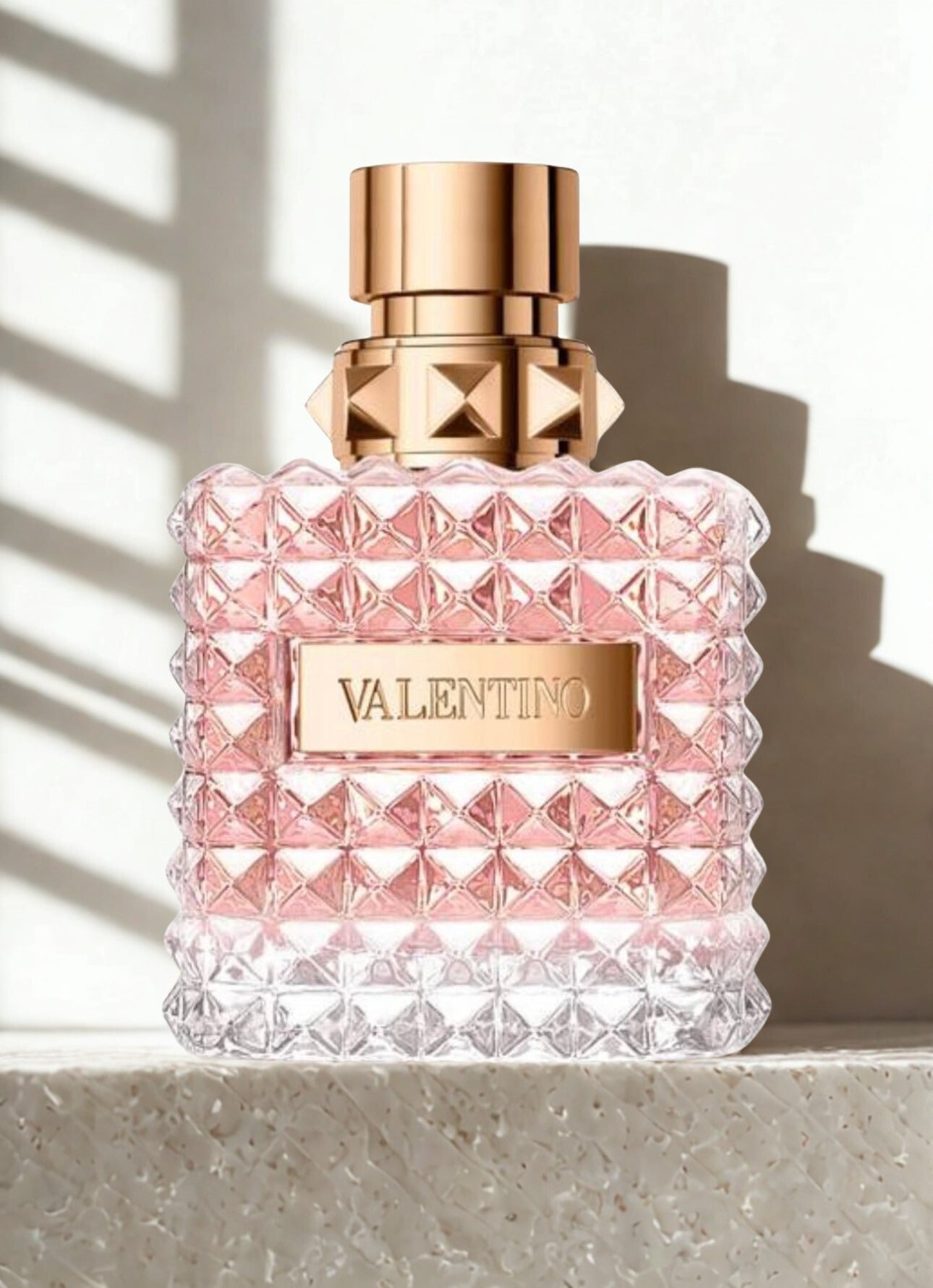 Valentino Donna 100ml women's Eau de Parfum bottle with elegant packaging, showcasing the luxurious fragrance for women.